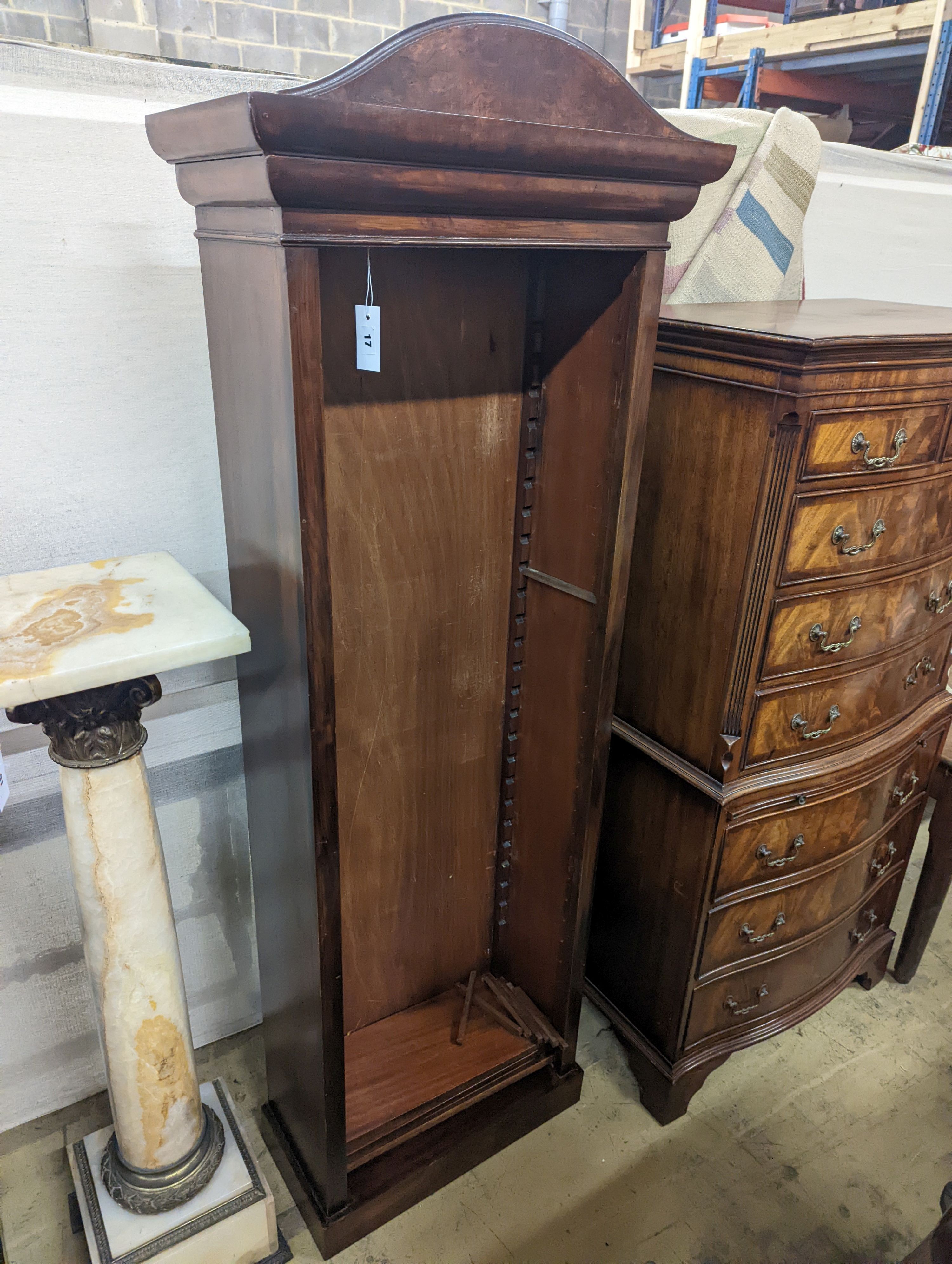 A George II style narrow walnut open bookcase, width 65cm, depth 30cm, height 184cm